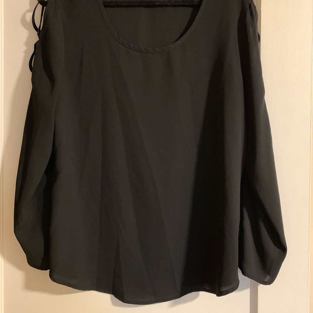 Black crisscrossed sleeve top